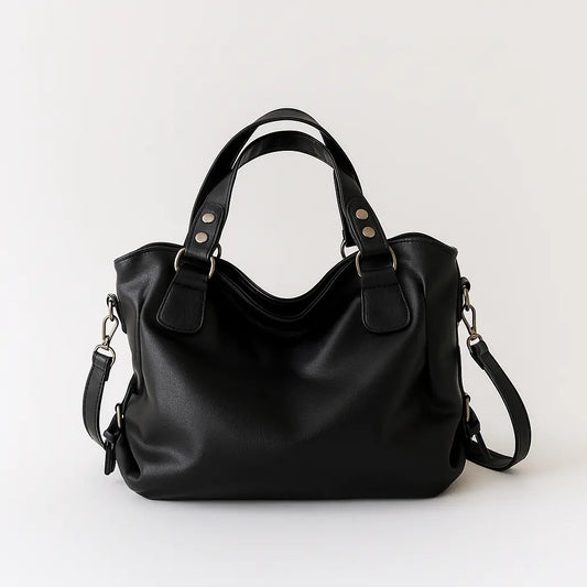 Sac CLARA noir en cuir, posé sur fond blanc.