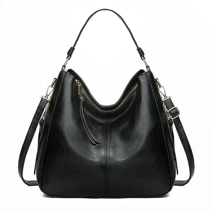 Sac ÉLISE noir en cuir, posé sur fond blanc.