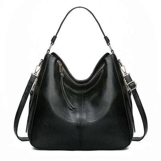 Sac ÉLISE noir en cuir, posé sur fond blanc.